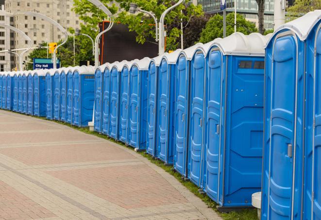 a clean row of portable restrooms for outdoor weddings or festivals in Cranford